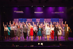 Image shows the last pose of the 9 to 5 finale number.